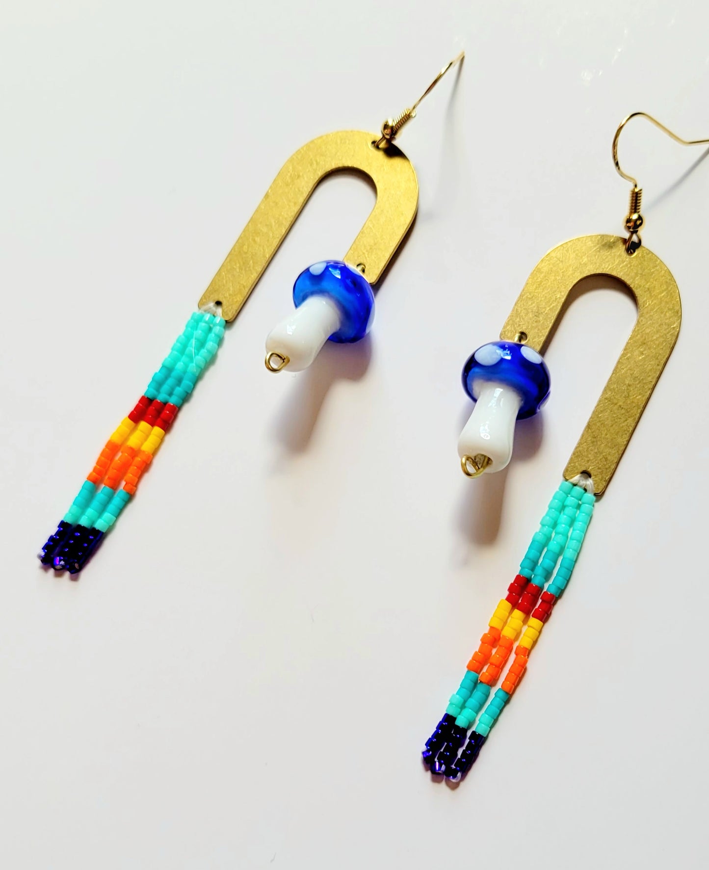 Mushie & Brass Rainbows in Cornflower Blue
