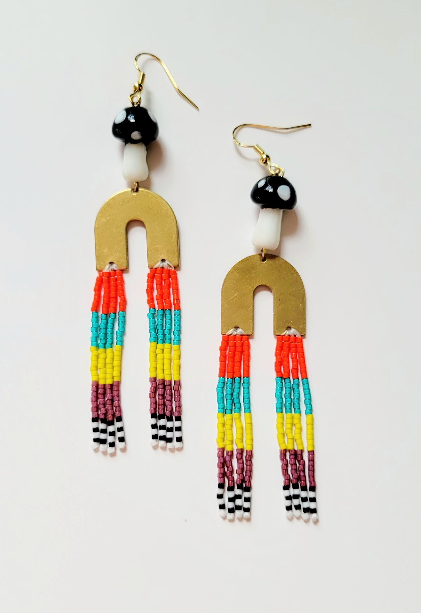 Mushie & Brass Rainbows in Moderne